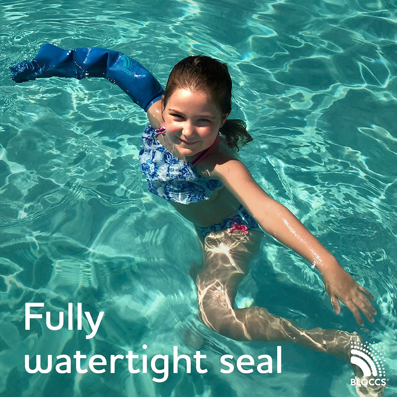 Girl swimming in a pool with a bloccs full arm cast cover with a fully water tight seal