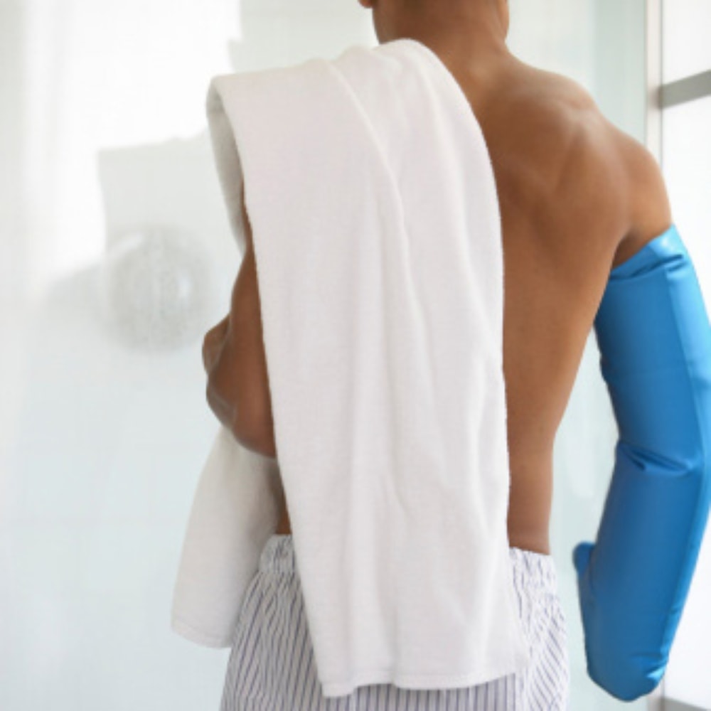man wearing a bloccs full arm waterproof cover