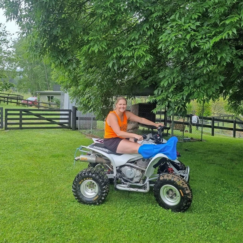 Vicki out and about on the farm with her short leg cast cover