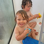 Stacey's son wearing his waterproof leg cast cover