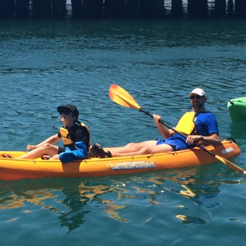 Kayaking in Wellington harbour with a full arm cast cover
