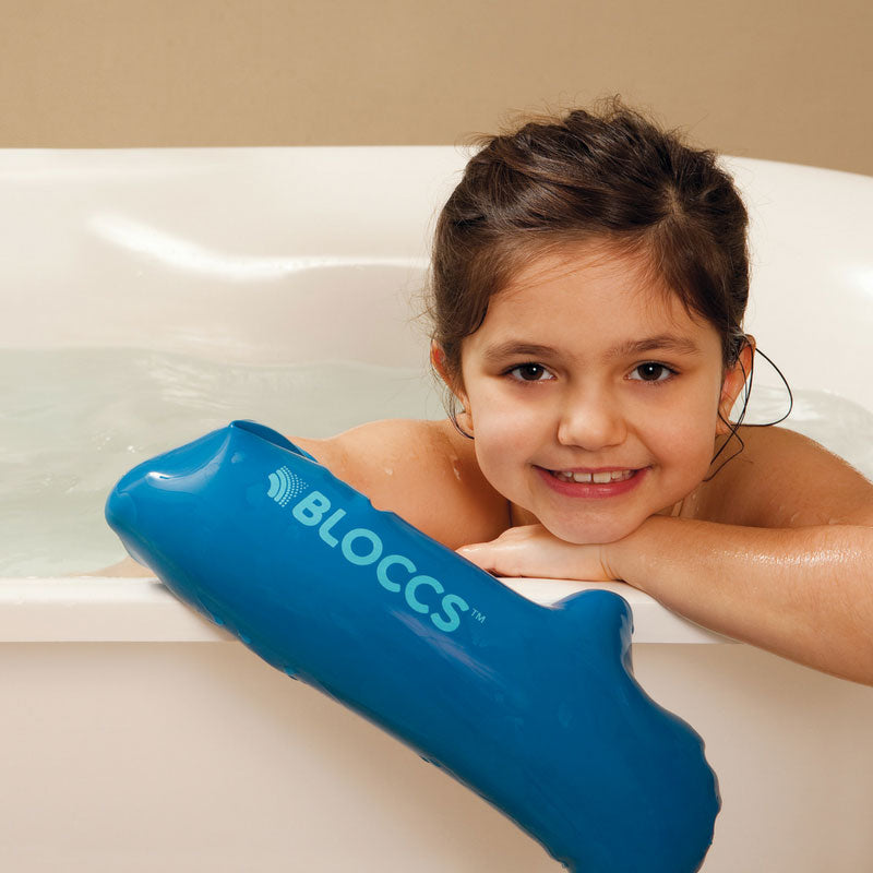 Girl wearing waterproof sleeve for arm cast